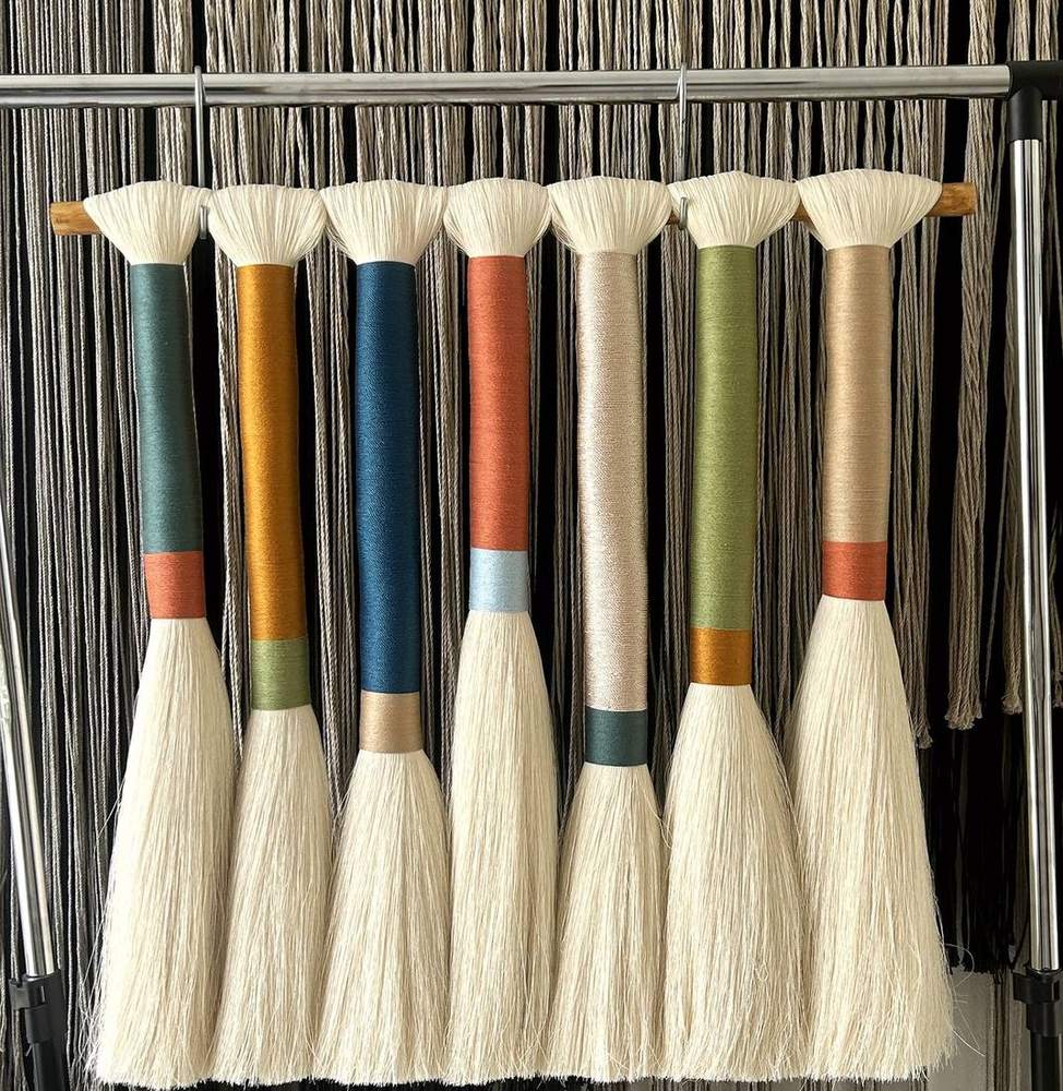 Borlas de algodón envueltas en colores