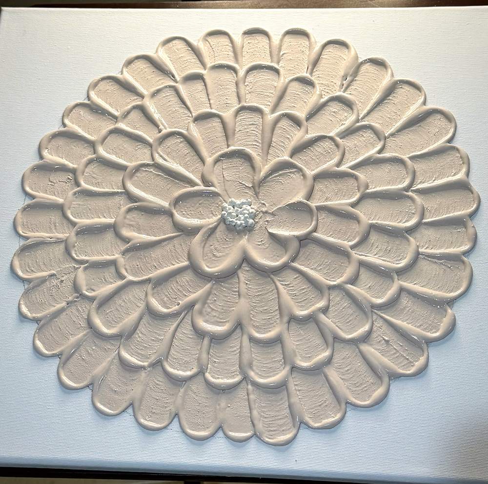 Cuadro de textura en relieve con forma de flor